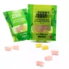 Bright green packs of vegan THC gummies with scattered colorful gummies.