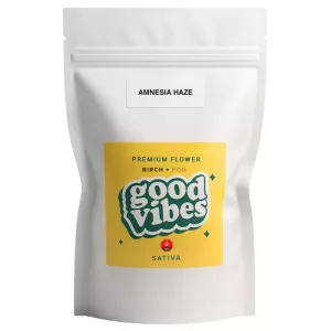 White pouch with yellow label, text good vibes, and amnesia haze.