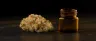 Batgirl weed strain dense trichome-frosted buds