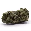 Dried cannabis bud close-up: green, orange, frosty trichomes, compact, potent, high-quality.