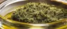 Cannabis concentrate slurry poured into a container